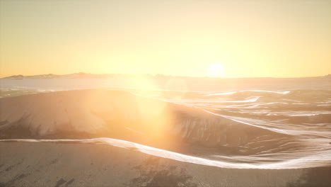 red sand desert dunes at sunset