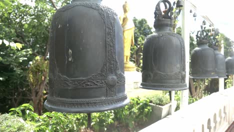 looking at the bells in the temple