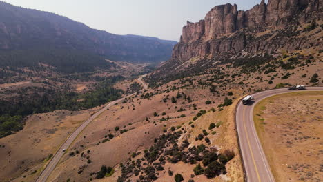 serpentine mountain highway in a rocky valley