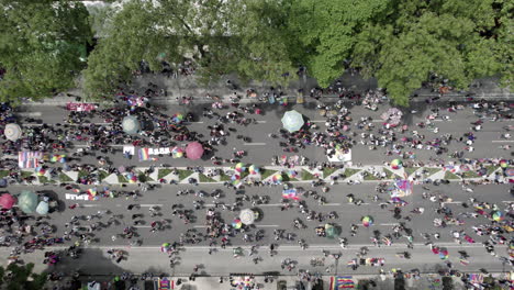 aerial drone shot over paseo de la reforma in the pride parade in mexico city