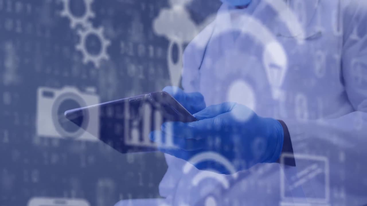 얼굴 마스크를 쓰고 메모를 하는 아프리카계 미국인 남성 의사의 중간 부분에 있는 기술 아이콘의 애니메이션