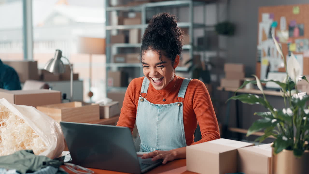 Excited Woman Celebrating Business Success in Office