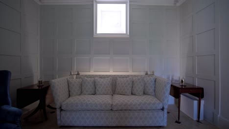 slow pullout shot of a games room within a chateau with matching chairs