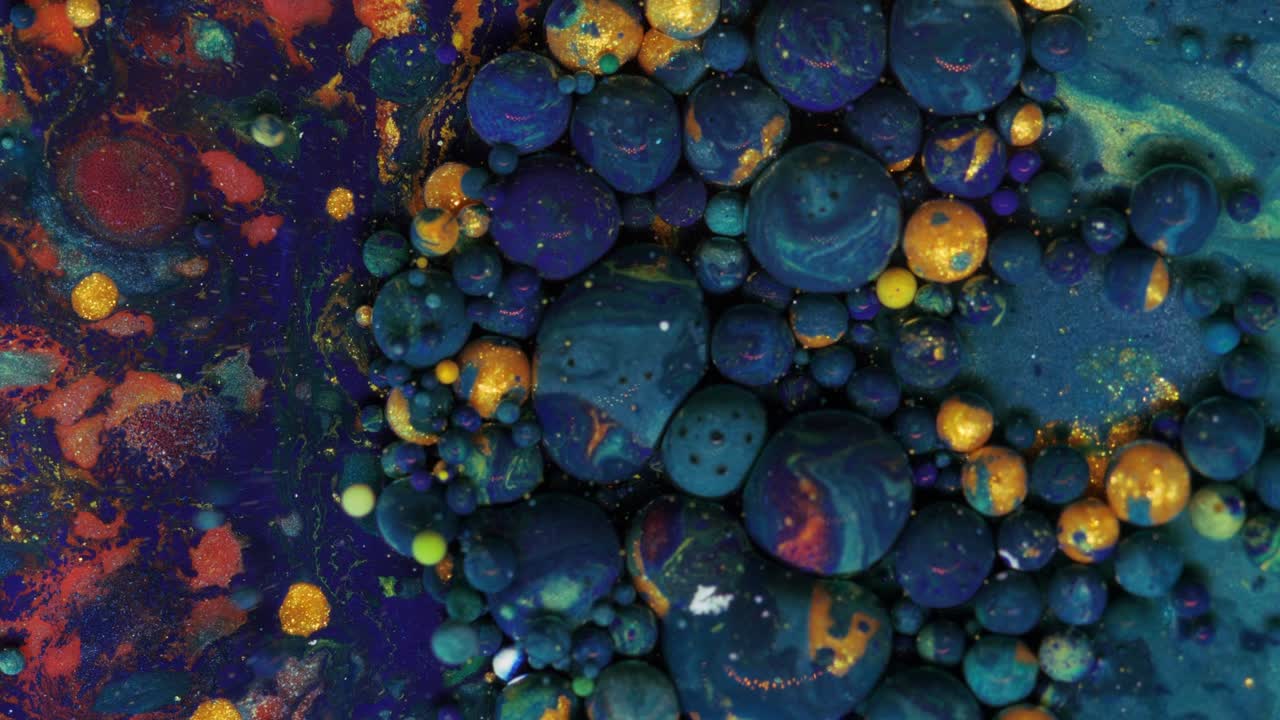 fondo pastel en movimiento que consta de bolas púrpura-azul que se mueven de una manera caótica.