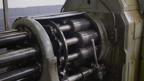 close up of rotating machinery of a spindle screw machine