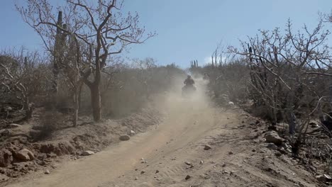 quad bikes on dusty track 000