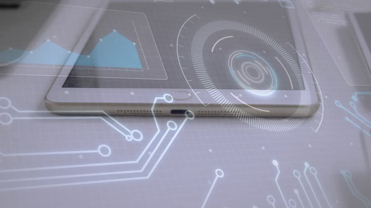 Tablet powering, HUD spinning, circuits extending, graph appearing above paper for analysis