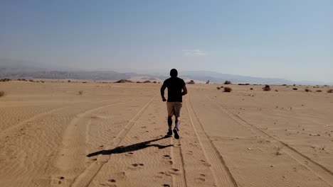 running through the desert in slomo