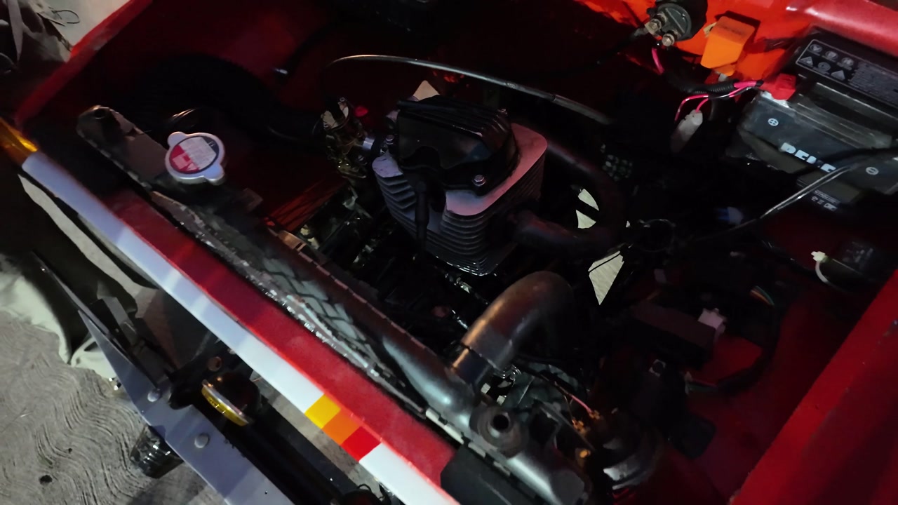 Close-up of custom car motor built at home, highlighting craftsmanship