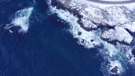 aerial view of of the djupfjordbrua bridge in norway that crosses the djupfjorden fjord in moskenes