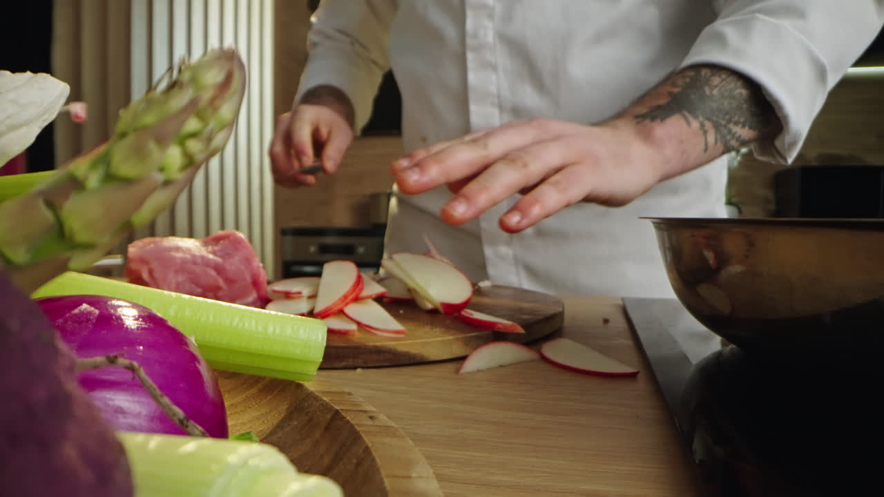 Chef preparing vegetables in the kitchen