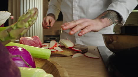 chef preparing vegetables in the kitchen