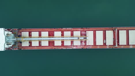 aerial top-down view of a large bulk carrier cargo ship