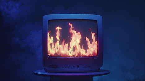 vintage tv with fire on screen