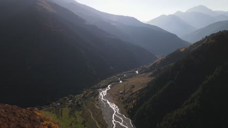 mountain valley with river and autumn colors