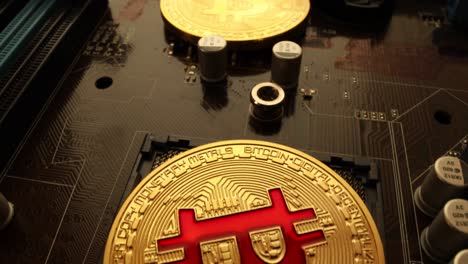 gold bit coin btc coins on the motherboard. bitcoin is a worldwide cryptocurrency and digital payment system called the first decentralized digital currency.