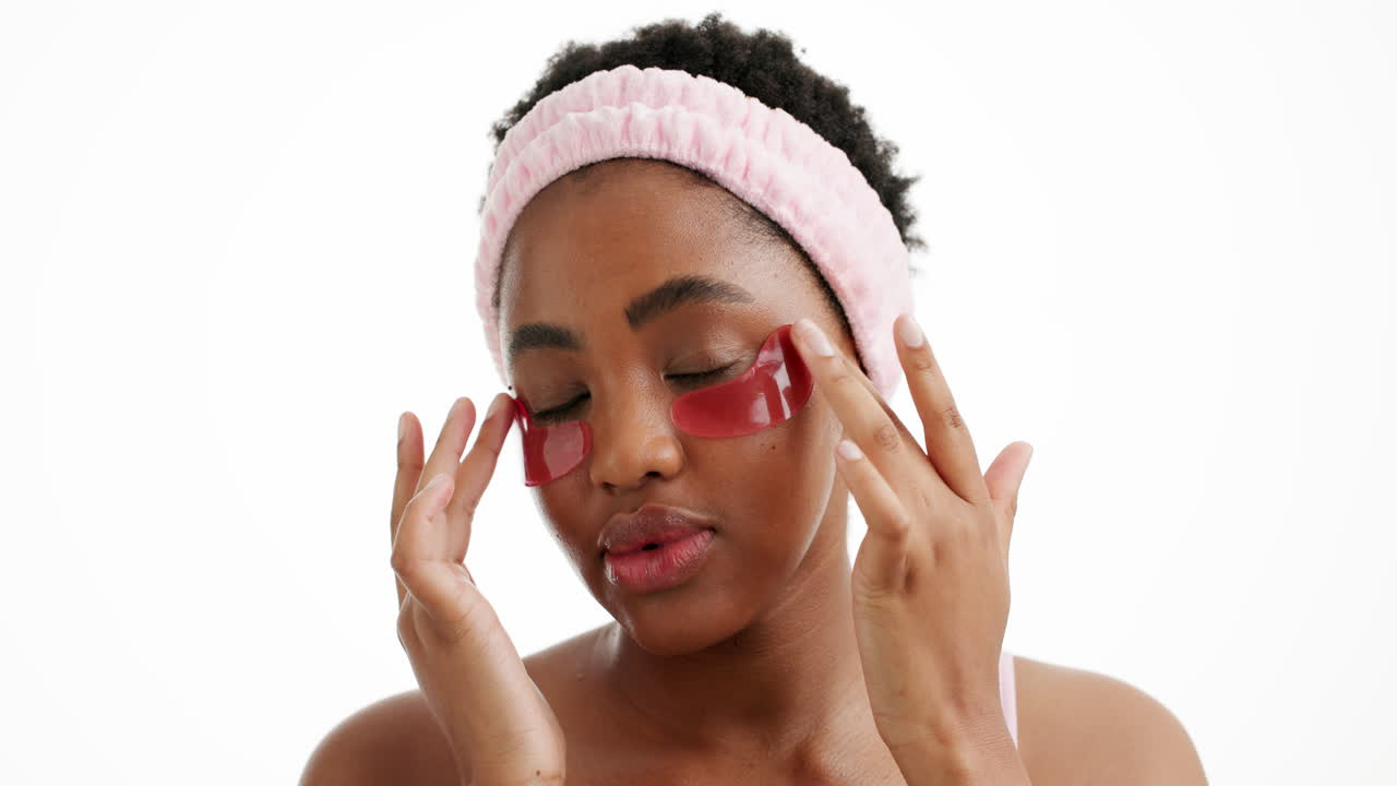 Woman with eye patches and headband