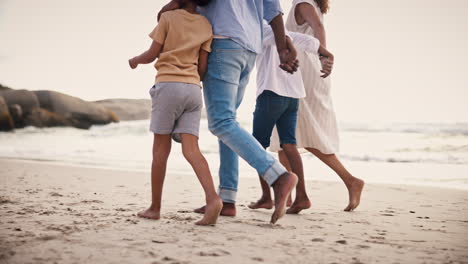 walking, legs of happy family on beach together