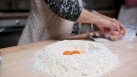 ingredients for tortellini on wooden table