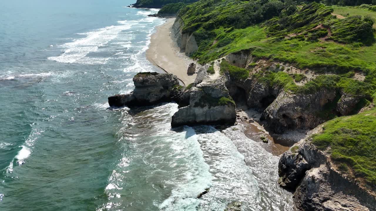 Coastal cliffs and waves, scenic view from above, summer tranquility