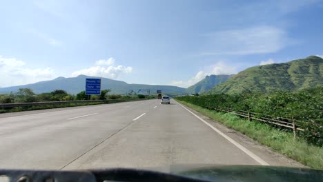 overtaking a traditional indian truck on the mumbai pune highway expressway