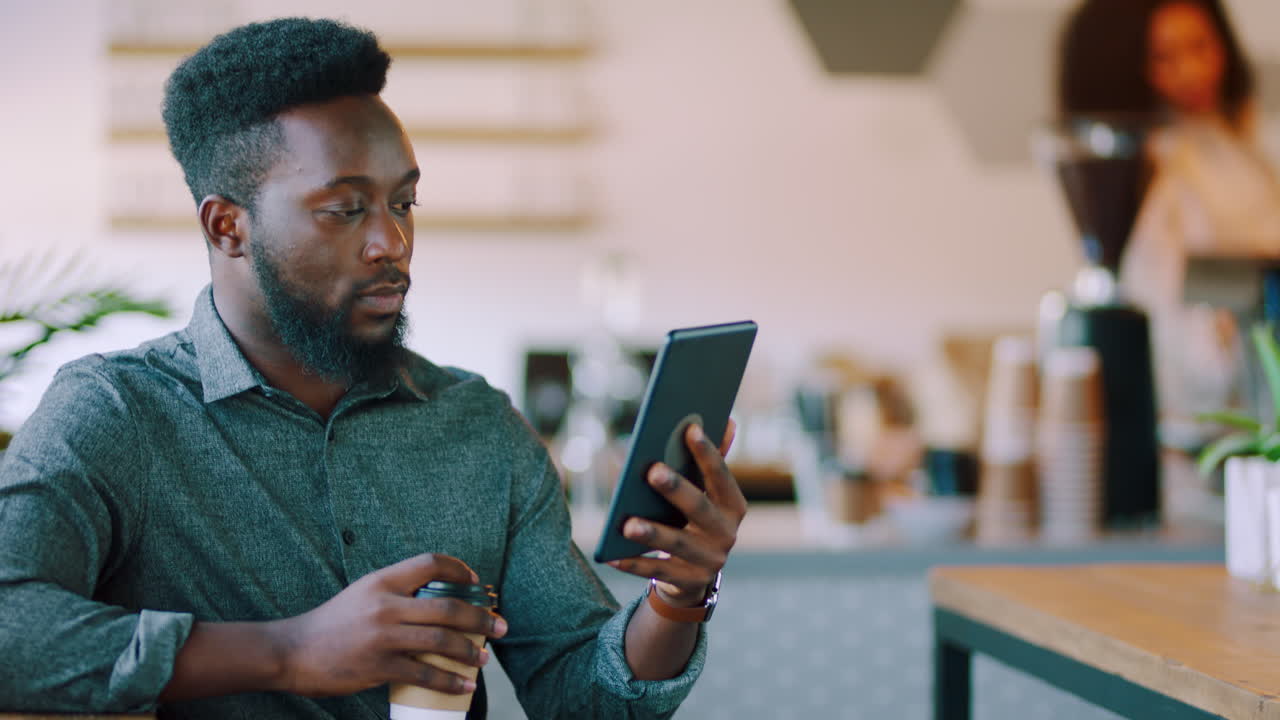Digital tablet, coffee and businessman in a coffee
