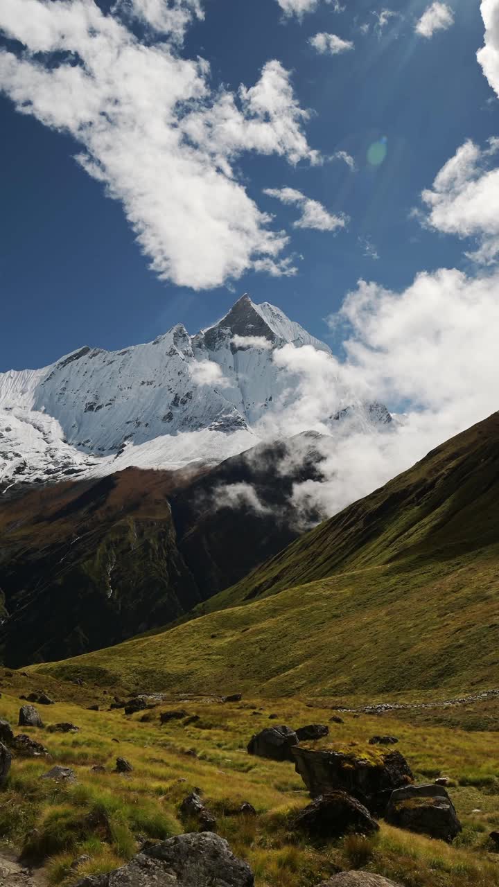 Vertical Nepal Mountains Landscape, Big High Altitude Snowcapped Himalayas Mountains Scenery, Vertical Video for Social Media Instagram Reels and Tiktok of Mountain Tops on Blue Sky Sunny Day
