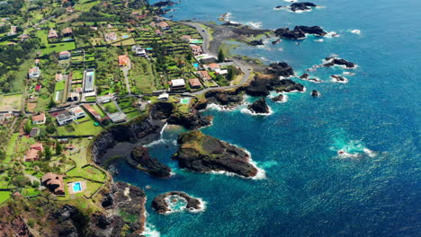 cinematic aerial drone view of beautiful coastline in sao miguel island, azores - portugal