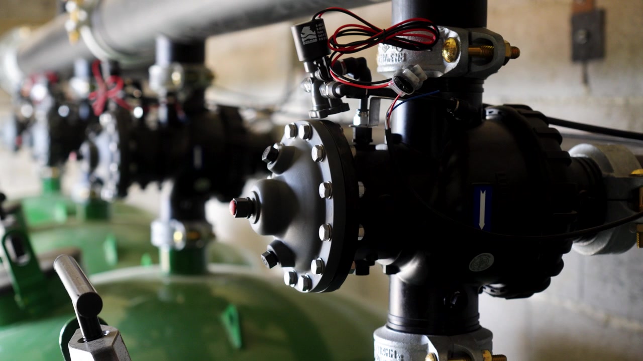 Close Up of Irrigation Control Valve and Water Pipeline System at Agricultural Water Treatment Facility