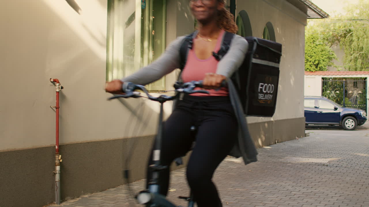 Woman riding a bicycle on a city street