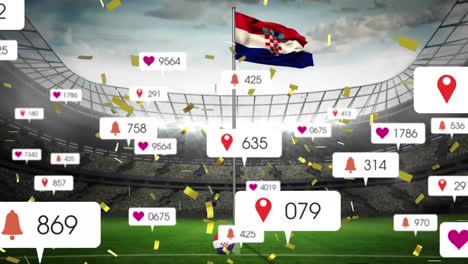 Animation-Von-Social-Media-Symbolen-Und-Konfetti,-Die-über-Die-Wehende-Kroatische-Flagge-Gegen-Das-Sportstadion-Fallen