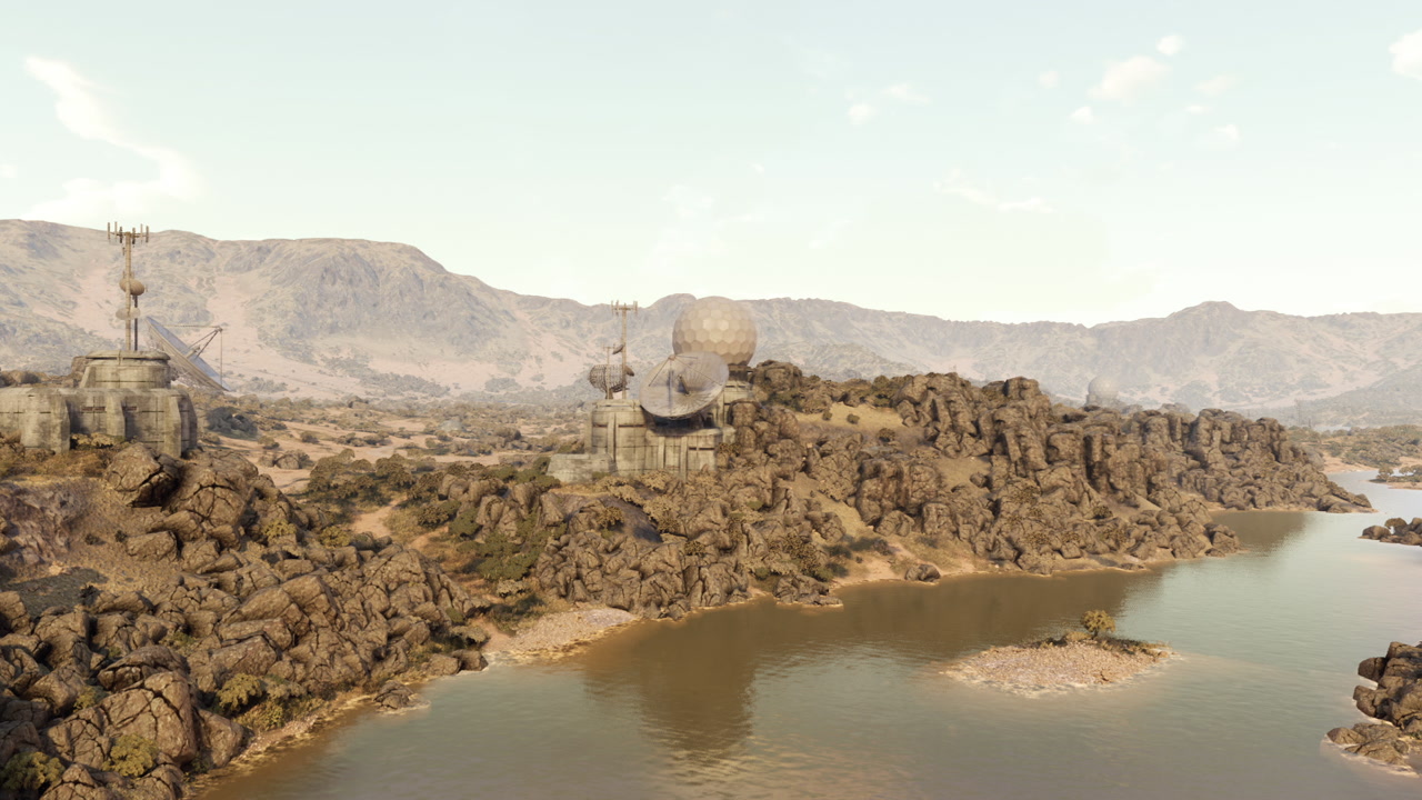 Rocky landscape with large structure near water under clear sky
