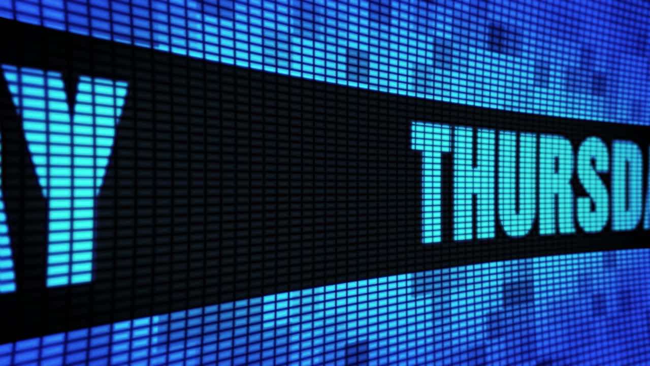 THURSDAY displayed on a digital LED screen