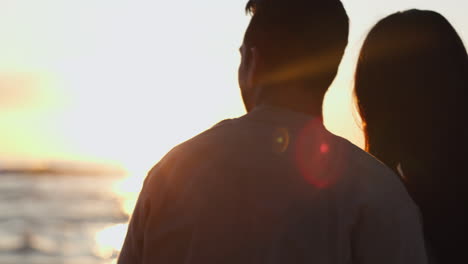 Beach-silhouette,-sunset-view-and-couple-relax