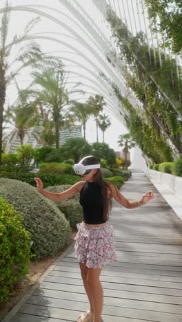 woman experiencing virtual reality in a park