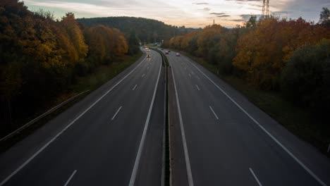 timelapse of highway from bridge during sunset