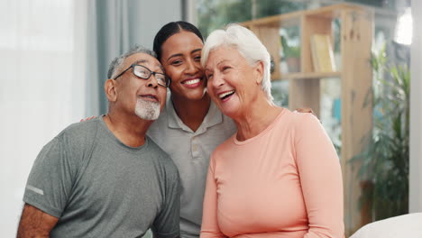 Senior-couple,-nurse-and-hug-with-healthcare