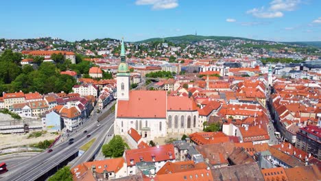 wave of orange buildings in bratislava, slovakia from the sky