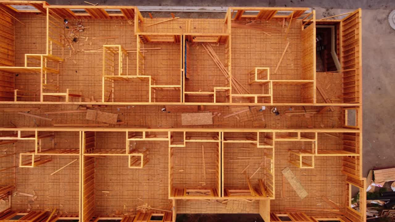 Wood framed construction site left abandoned as work stopped due to pandemic supply chain shutdown