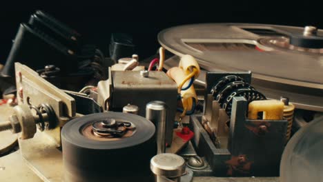 Close-up of a vintage reel-to-reel tape recorder