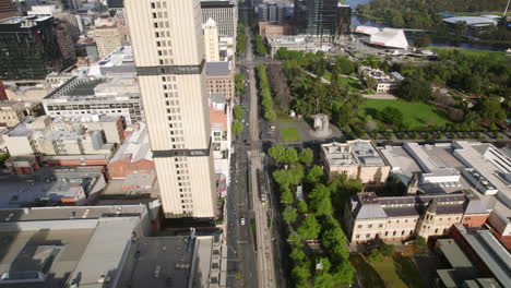 aerial view backwards over the north terrace road, sunny afternoon in adelaide