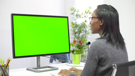 Woman-Working-at-Computer-Chroma-Screen