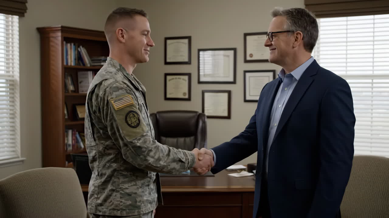Soldier and Businessman Shaking Hands in Office