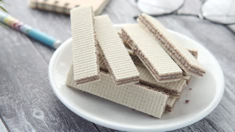 stacked chocolate wafers on a plate