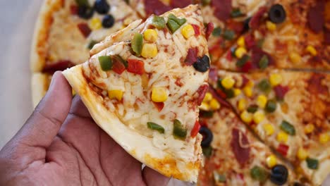 Pizza Slice with Cheese, Vegetables, and Olives