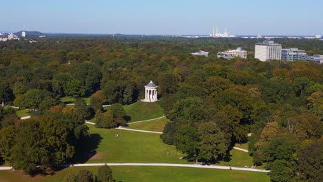 Marvelous-aerial-top-view-flight-Monopteros-pavilion
English-Garden-Munich-Germany-Bavarian,-summer-sunny-blue-sky-day-23