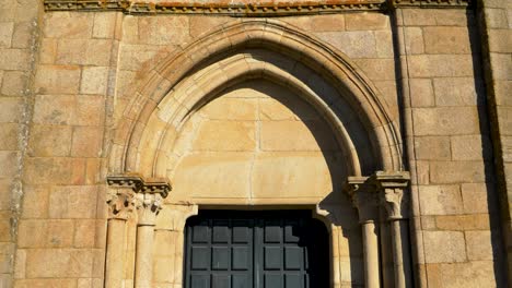 gothic stone archway of an ancient building