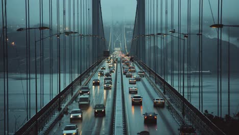 rainy night bridge traffic