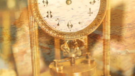 old fashioned clock with spinning map