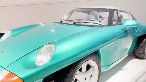 exhibition of retro racing cars of the porsche com 2023 11 27 05 21 29 utc.mov | automobile, automotive, background, building